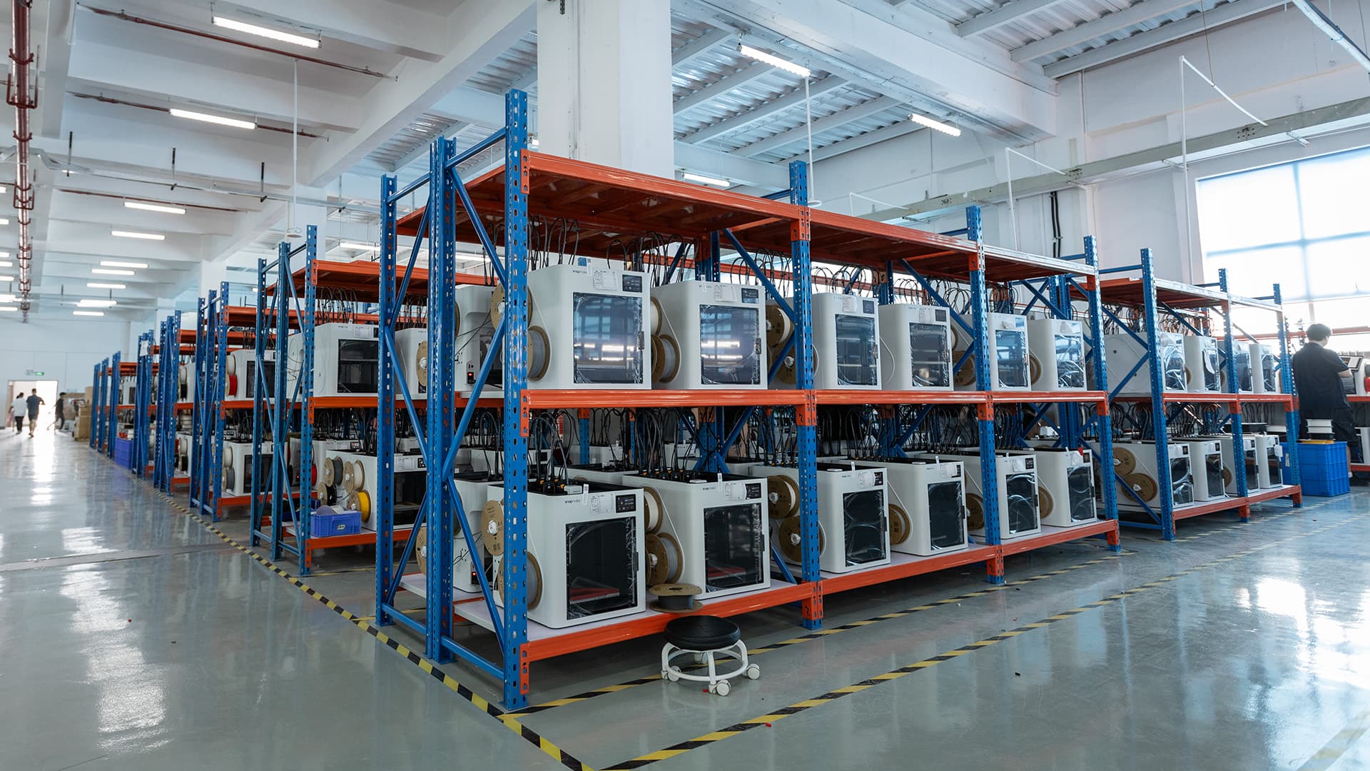 Snapmaker U1 production and packaging line showing units being prepared for shipment