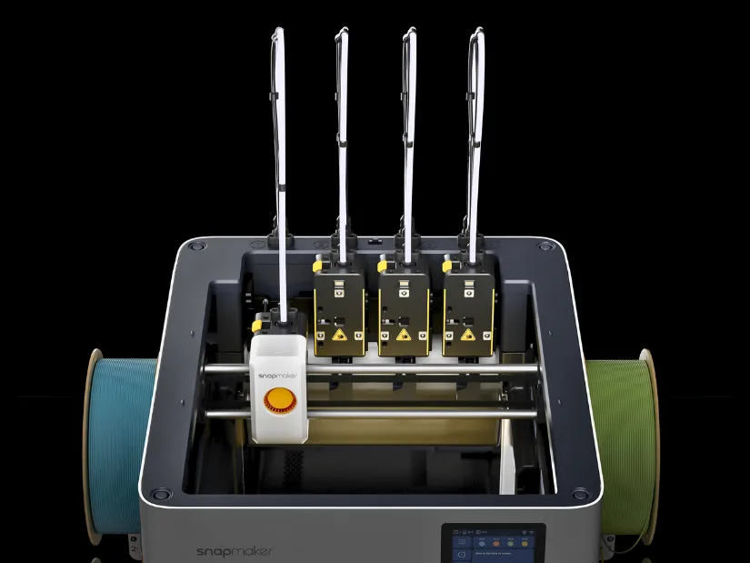 Close-up view of Snapmaker U1 SnapSwap tool-changing mechanism with toolhead docking