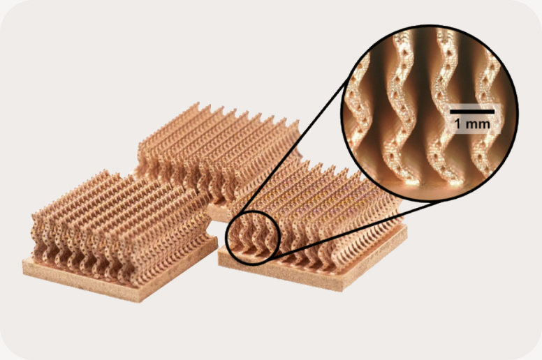 Fabric8Labs ECAM high-purity copper thermal management components with complex internal geometries